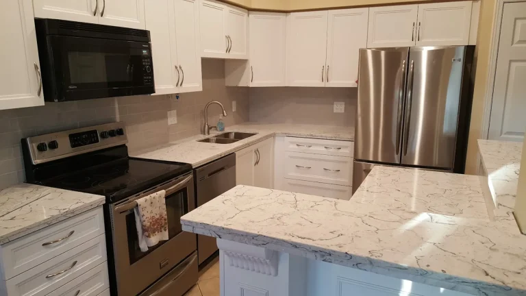 Modern white shaker kitchen with quartz countertops in Millcroft Burlington