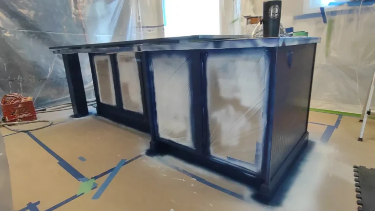 Kitchen restyling for this large Island with a Navy blue finish coat.